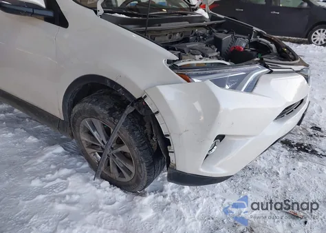 2018 Toyota Rav4 Limited z USA, uszkodzony, nr VIN JTMDFREV0JJ733931